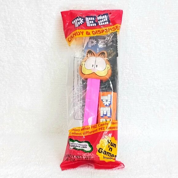 3/$30 Sealed Garfield & Friends Garfield on Pink PEZ Dispenser!! - Picture 1 of 2